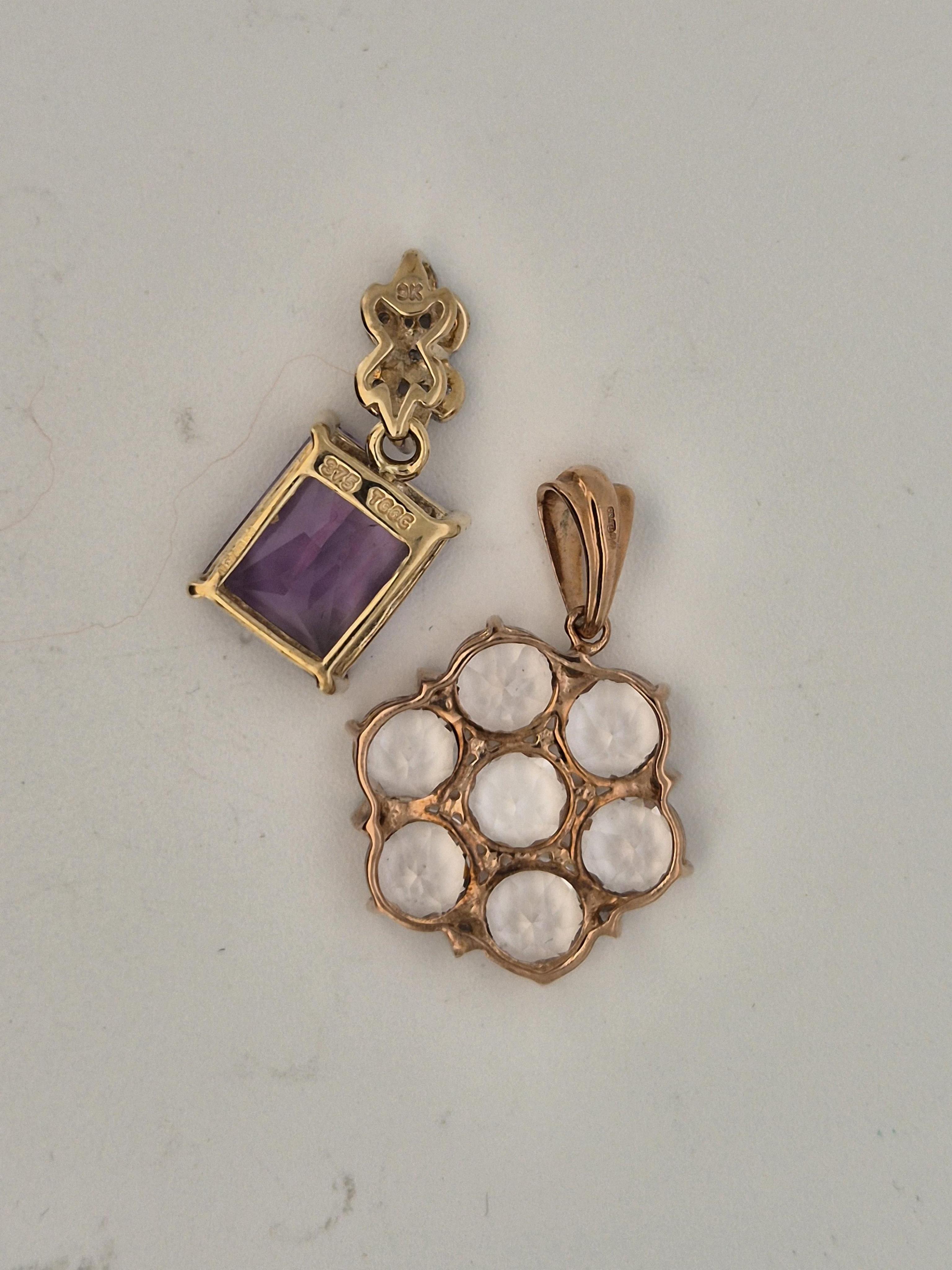 A modern 9ct gold and single stone rectangular cut amethyst pendant, with diamond chip set bale, overall 21mm, together with one other 9ct gold and gem set cluster pendant, gross weight 4 grams.
